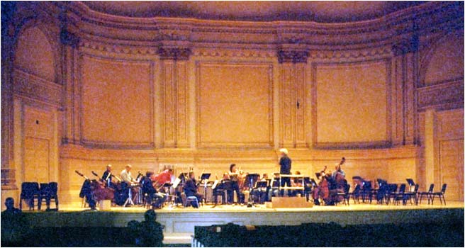 Tasmin rehearsing with Sir Simon Rattle and the Berlin Philharmonic